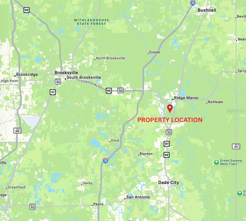 34095 Hyatt Road Dade City, FL 33523 - Photo 3 of 41 a bathroom with a swimming pool