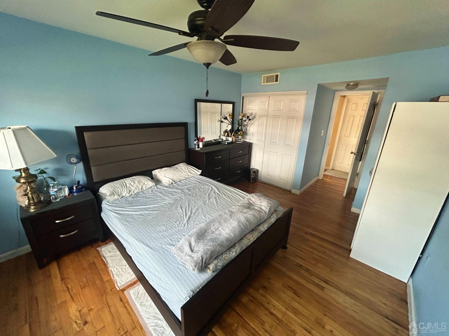 44 Judson Street, Unit 5A Edison, NJ 08837 - Photo 3 of 5 a bed sitting in a bedroom next to a window