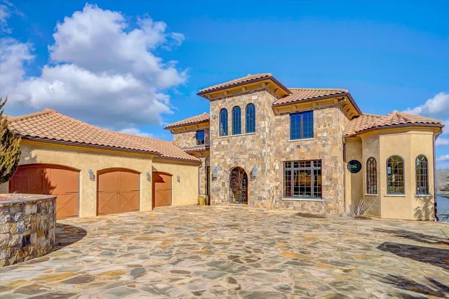 a front view of a house with a fireplace