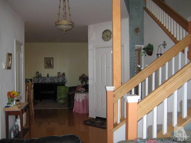 657 Cardinal Ridge Lane Simi Valley, CA 93065 - Photo 2 of 14 a view of an entryway with wooden floor