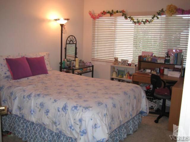 657 Cardinal Ridge Lane Simi Valley, CA 93065 - Photo 11 of 14 a bedroom with a bed and a window