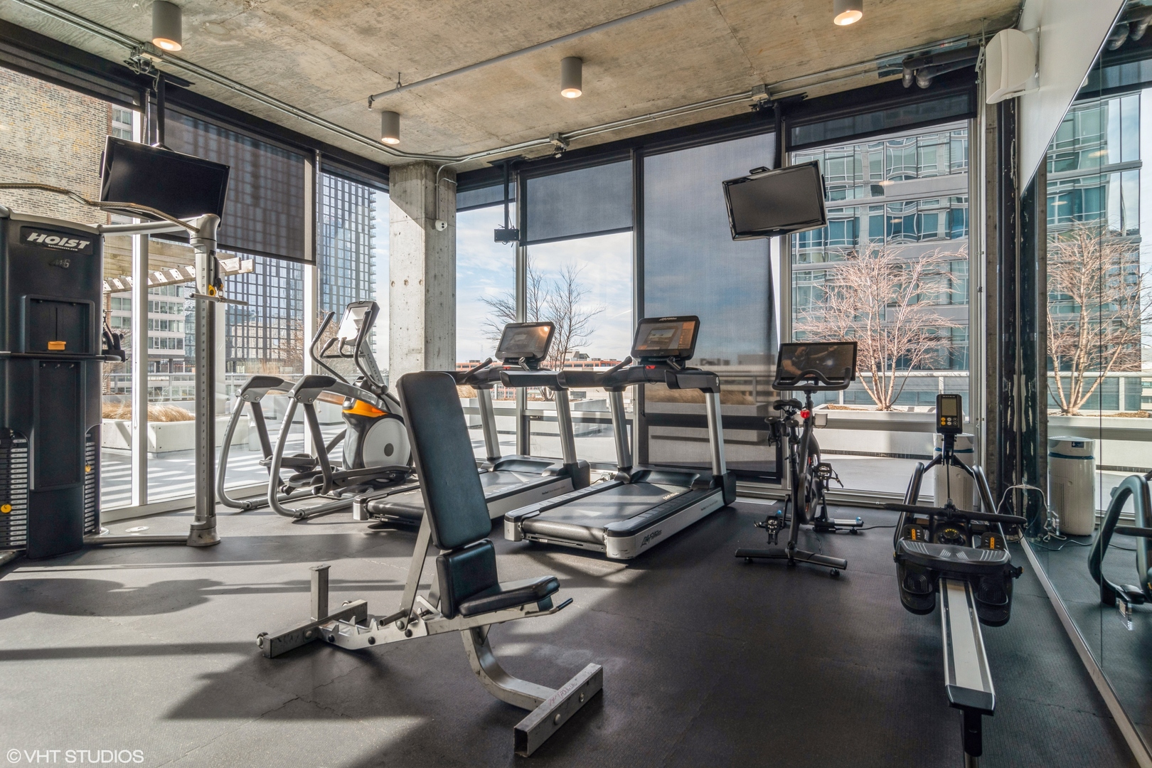 611 South Wells Street, Unit 1608 Chicago, IL 60607 - Photo 15 of 15 a view of a room with gym equipment