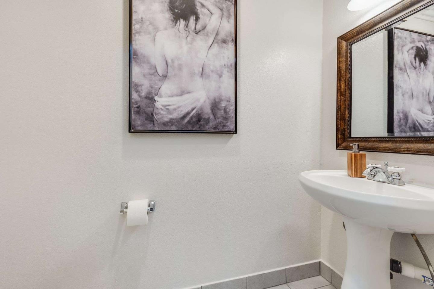 829 Montgomery Street Mountain View, CA 94041 - Photo 14 of 36 a bathroom with a sink and a mirror