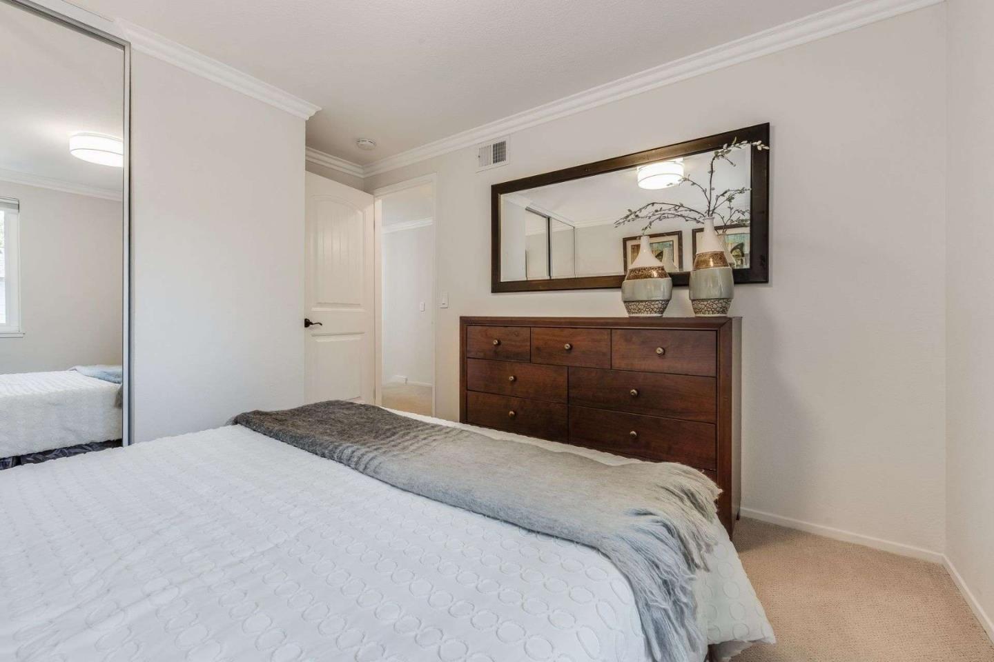 829 Montgomery Street Mountain View, CA 94041 - Photo 20 of 36 a bedroom with a bed and a dresser