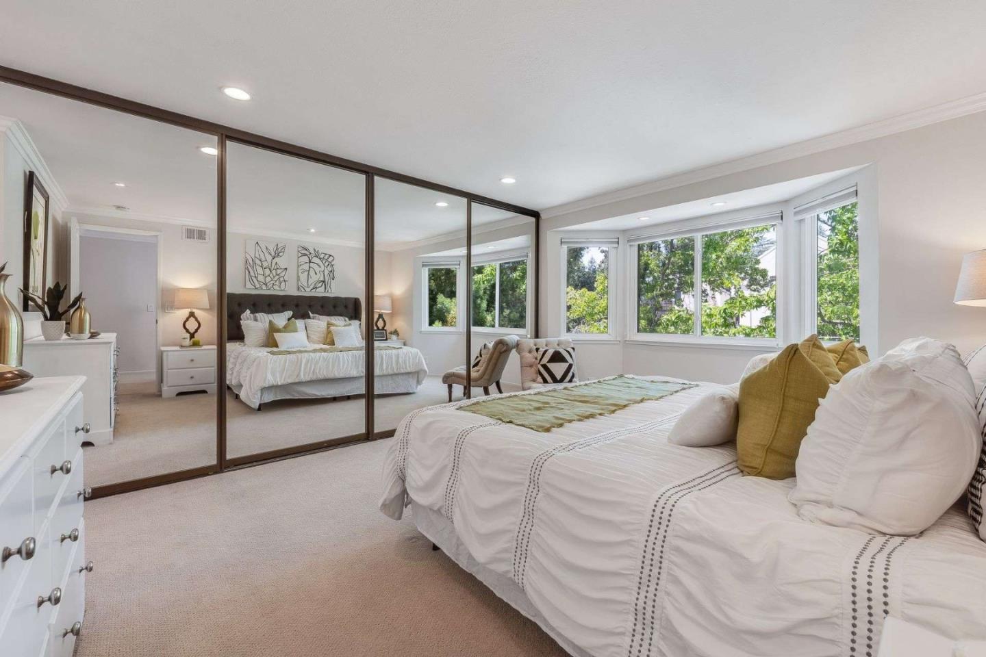 829 Montgomery Street Mountain View, CA 94041 - Photo 21 of 36 a bedroom with a large bed and a large window