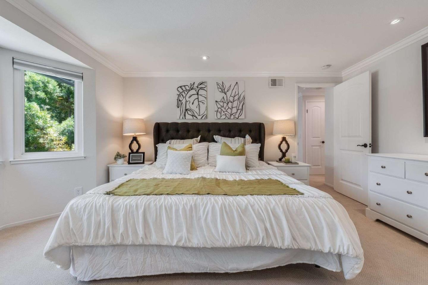 829 Montgomery Street Mountain View, CA 94041 - Photo 22 of 36 a bed sitting in a bedroom next to a window