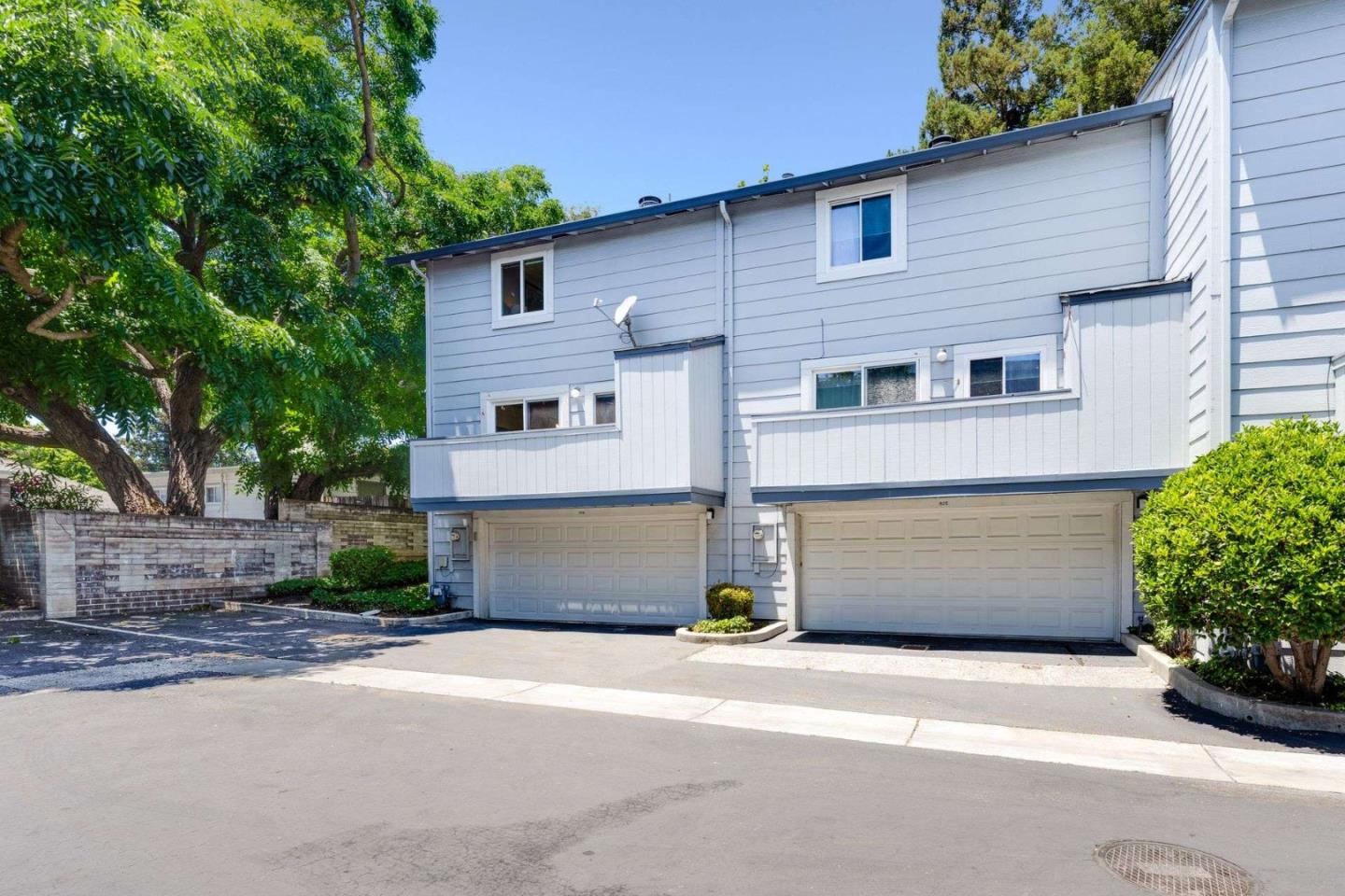 829 Montgomery Street Mountain View, CA 94041 - Photo 29 of 36 a front view of a house with a yard and garage