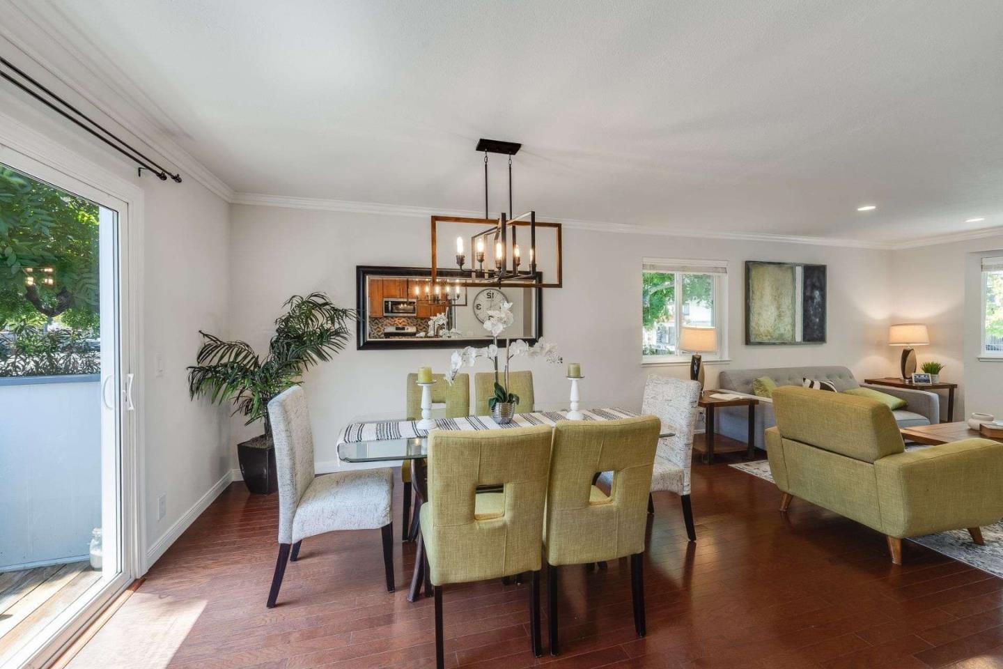829 Montgomery Street Mountain View, CA 94041 - Photo 10 of 36 a view of a dining room with furniture window and wooden floor