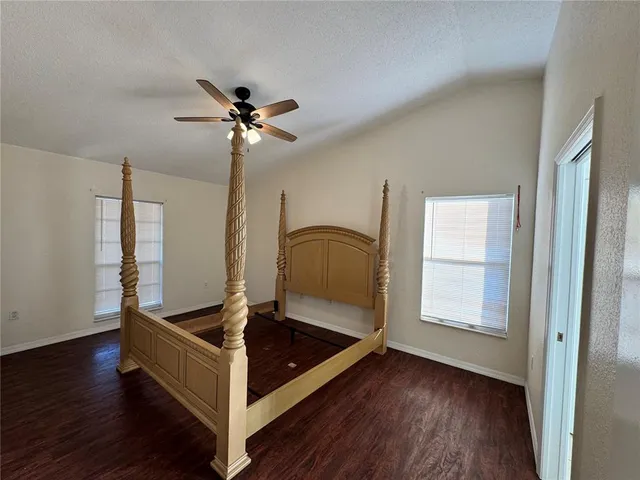 a living room with hard wood floors
