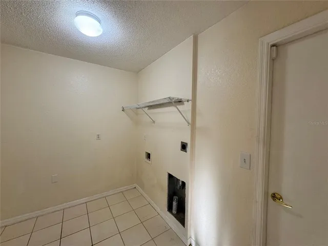 a view of a livingroom with wooden floor