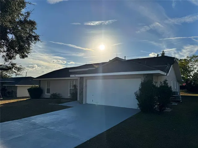 a view of house with outdoor space