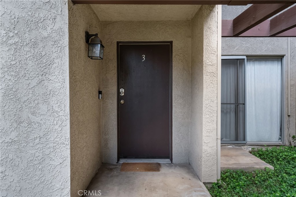 4424 San Jose Street, Unit 3 Montclair, CA 91763 - Photo 1 of 33 a view of front door