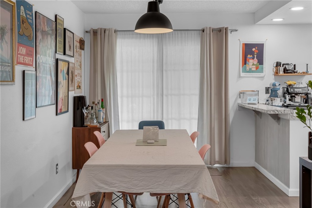 4424 San Jose Street, Unit 3 Montclair, CA 91763 - Photo 11 of 33 a bedroom with a bed and a chandelier