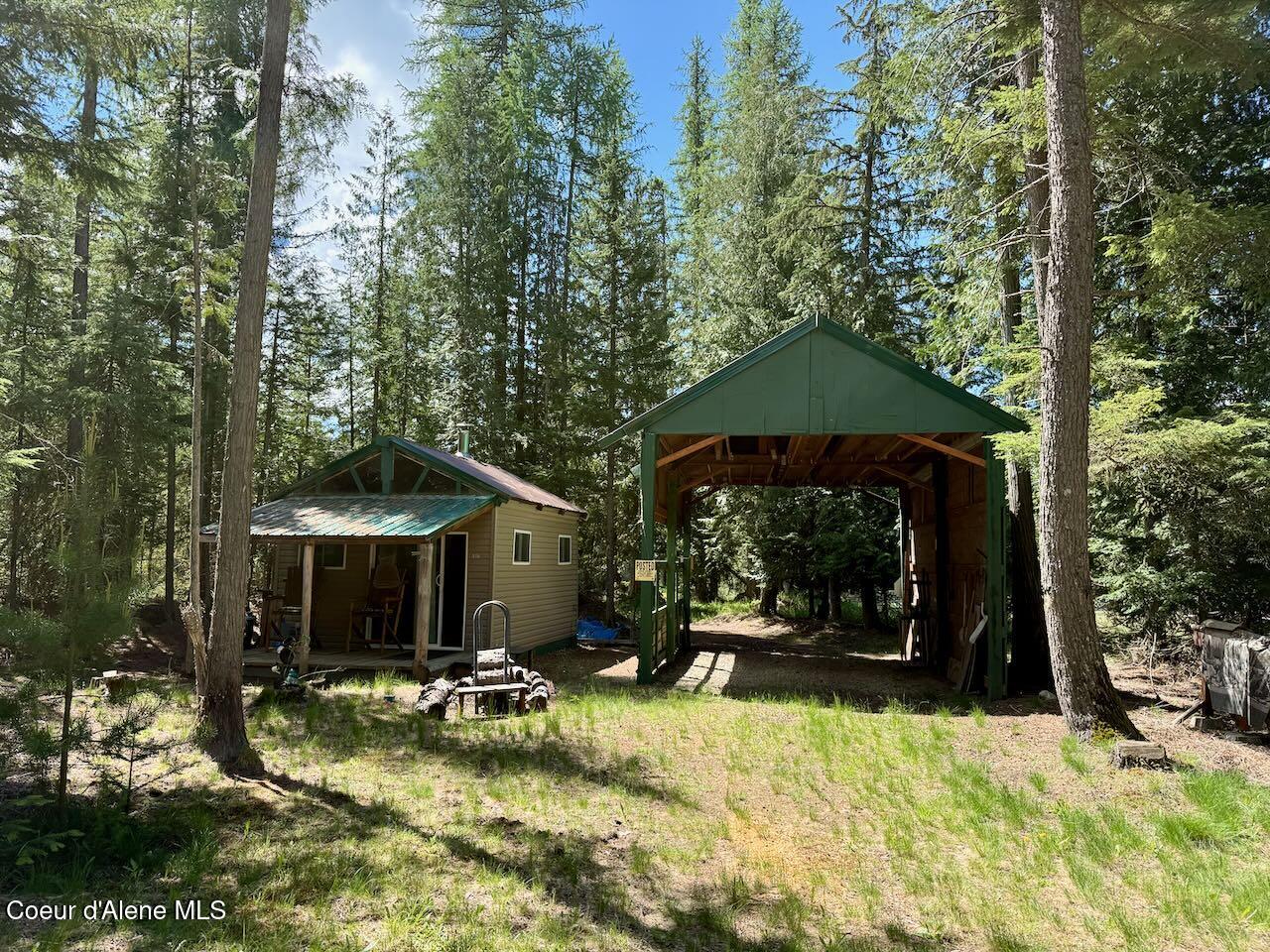 8213 Rapid Lightning Road Sandpoint, ID 83864 - Photo 1 of 40 Cabin & Covered RV