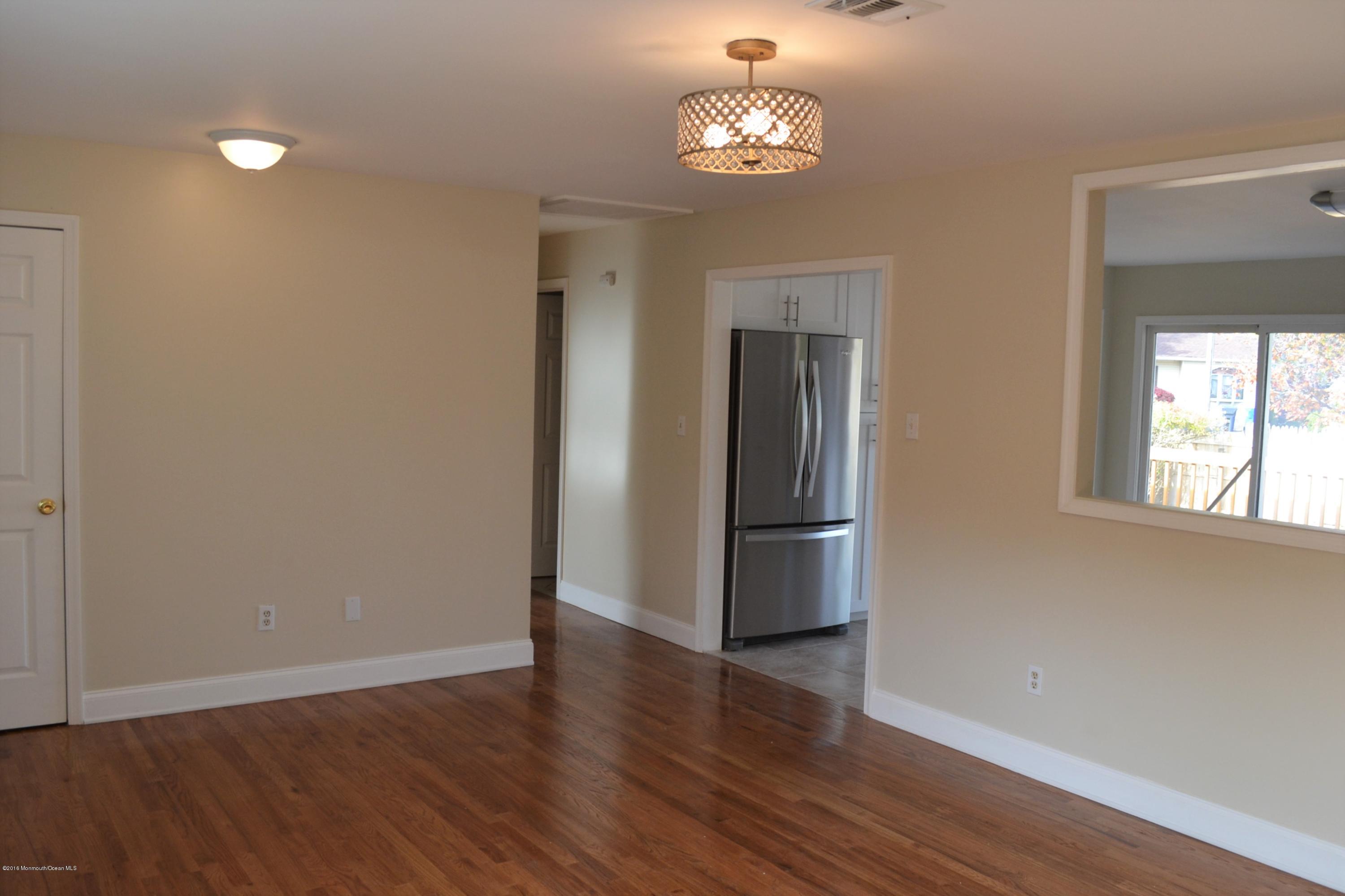 720 Old Burnt Tavern Road Brick, NJ 08724 - Photo 5 of 19 living room to kitchen