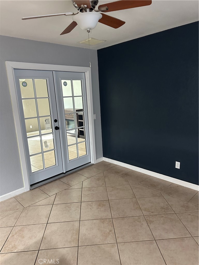 740 West Church Avenue Ridgecrest, CA 93555 - Photo 9 of 11 a view of an empty room with a window