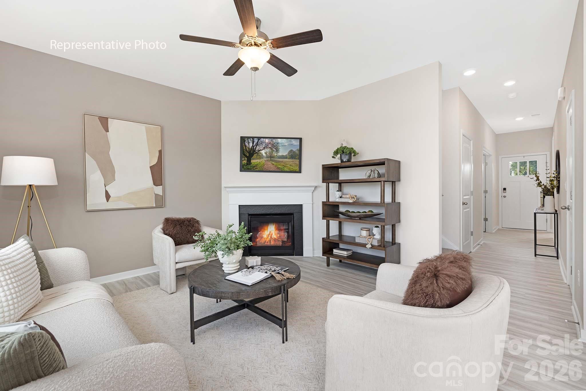 3036 Arundel Court Maiden, NC 28650 - Photo 4 of 22 a living room with furniture and a fireplace