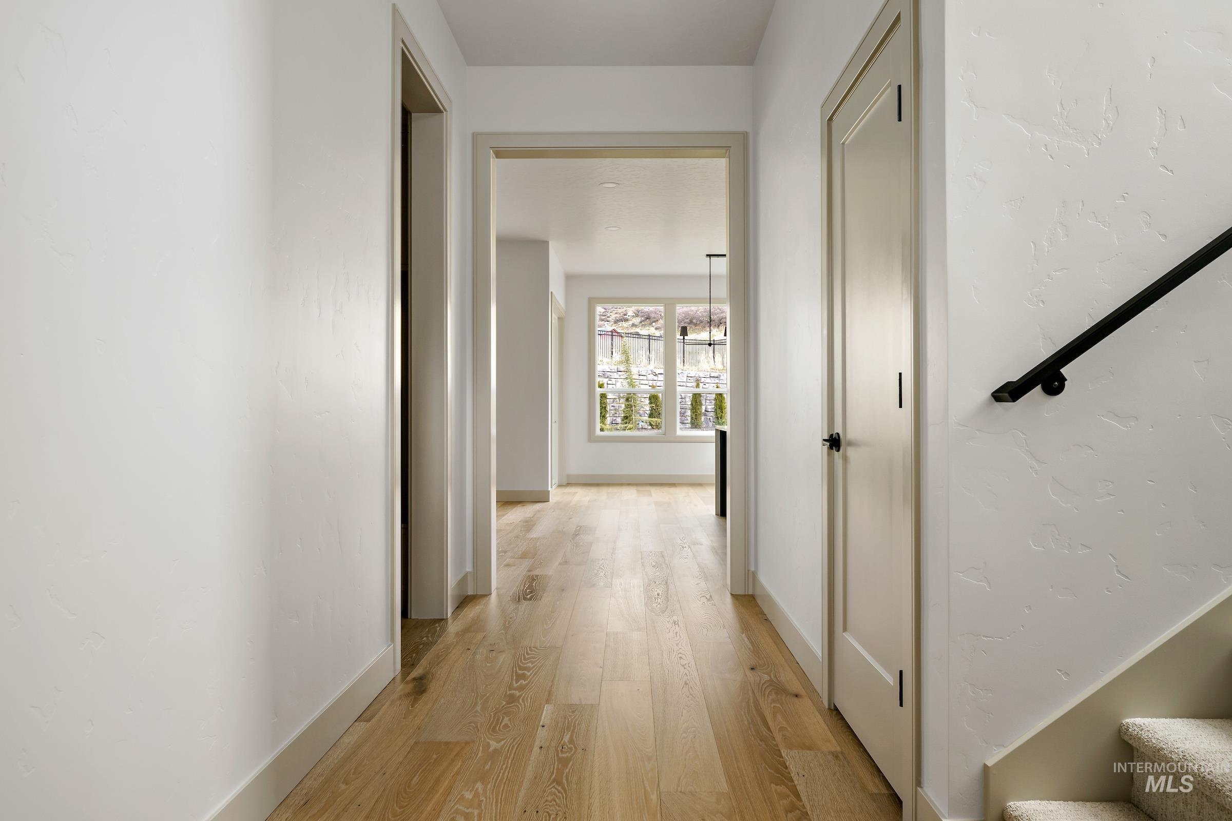 11696 North Rabbitbrush Way Boise, ID 83714 - Photo 11 of 32 Hall featuring light wood-style flooring and baseboards