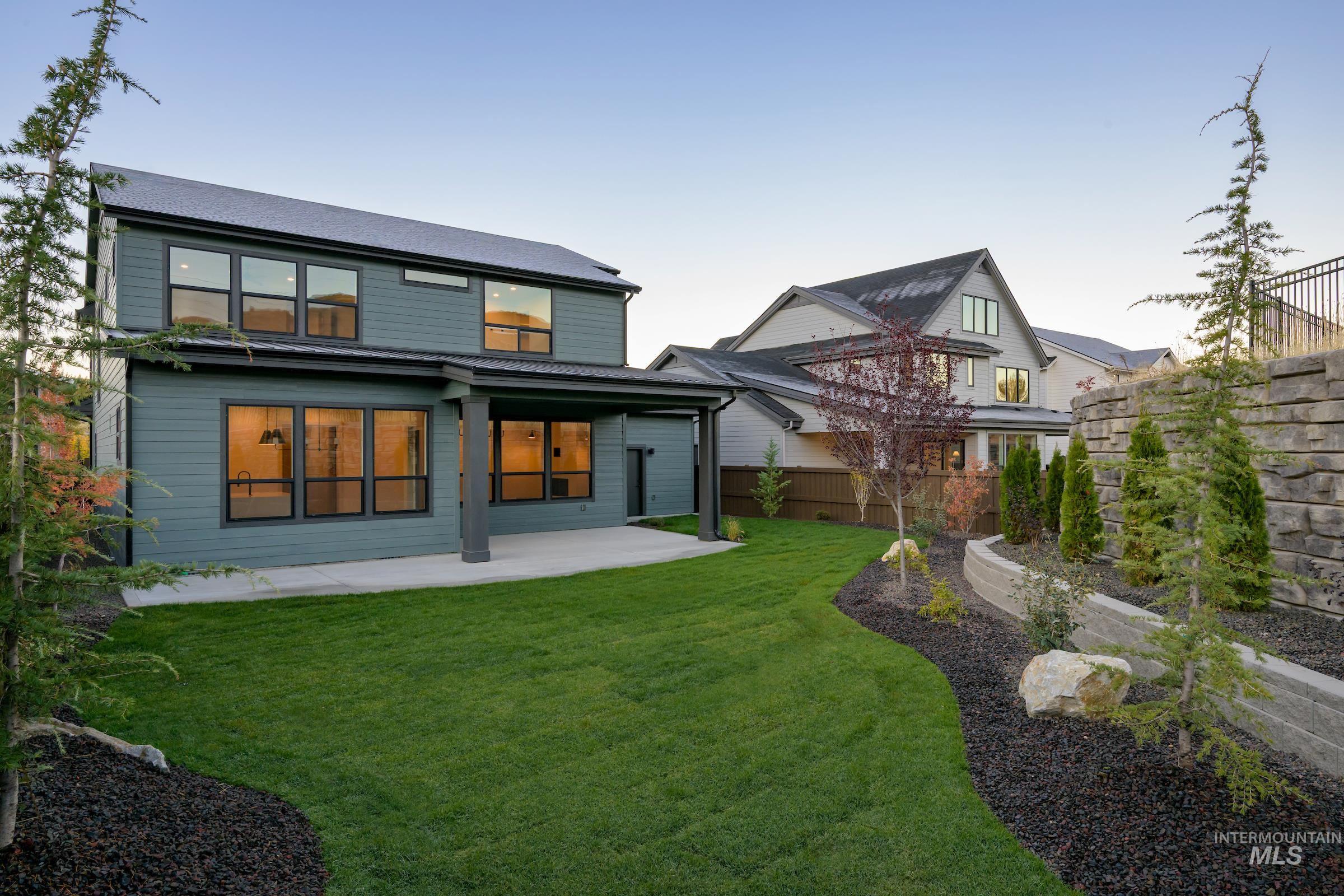 11696 North Rabbitbrush Way Boise, ID 83714 - Photo 16 of 32 Back of property featuring a patio