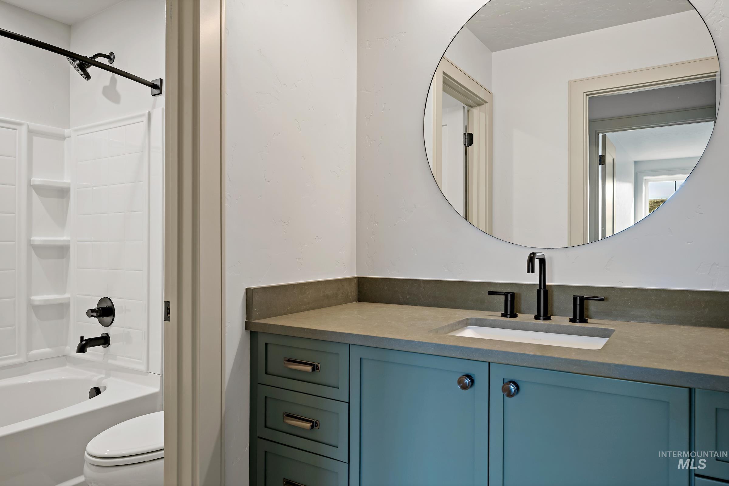 11696 North Rabbitbrush Way Boise, ID 83714 - Photo 28 of 32 Bathroom featuring washtub / shower combination and vanity