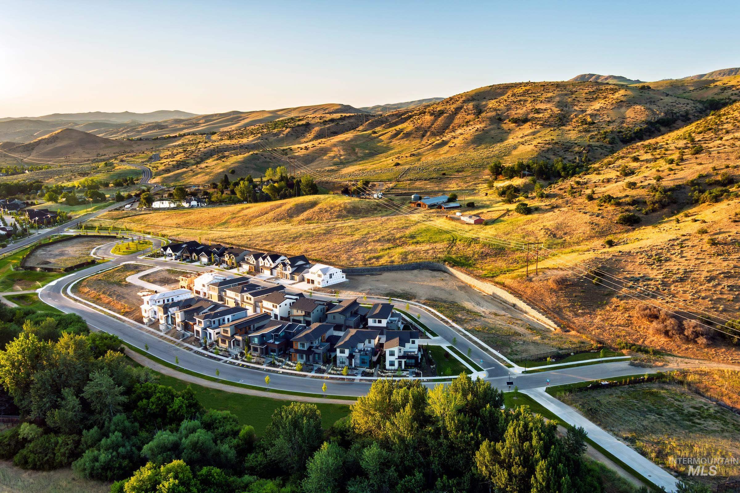 11696 North Rabbitbrush Way Boise, ID 83714 - Photo 7 of 32 Aerial view of property and surrounding area featuring a mountainous background