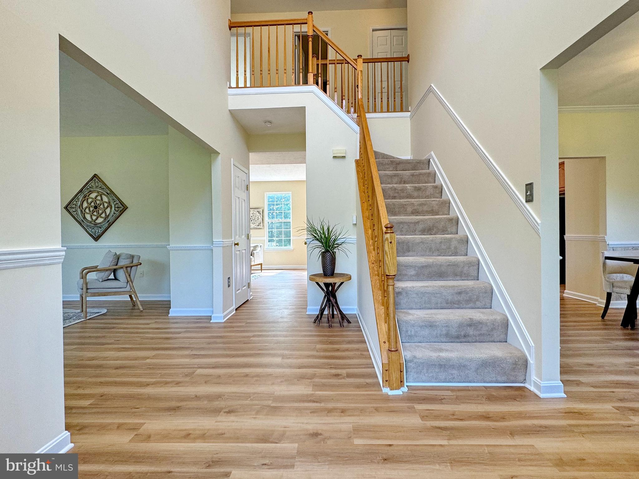 10020 Trinity Church Road Charlotte Hall, MD 20622 - Photo 7 of 99 New LVP flooring installed on main level