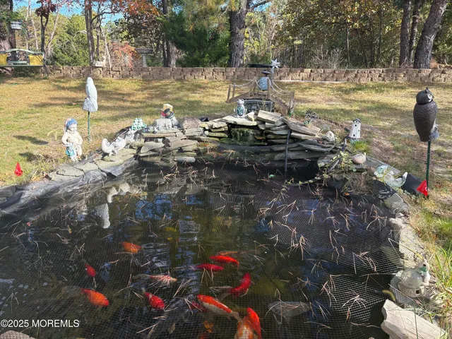 a view of a lake with a tree