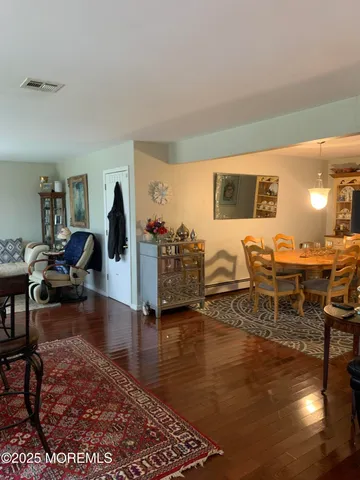 a living room with furniture and a table