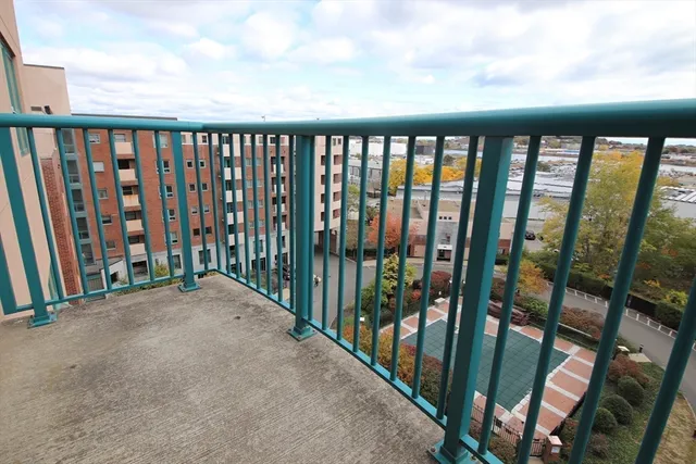 a balcony with outdoor view