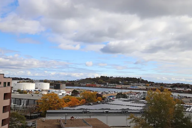 a kitchen with a sink stove and microwave