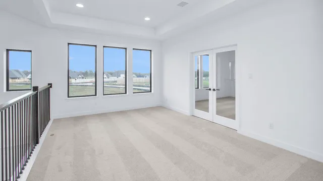 an empty room with windows