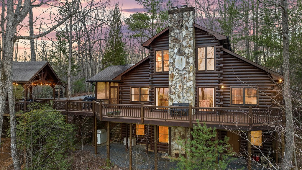 20 Broken Arrow Path Blue Ridge, GA 30513 - Photo 49 of 58 a view of house with backyard and sitting area