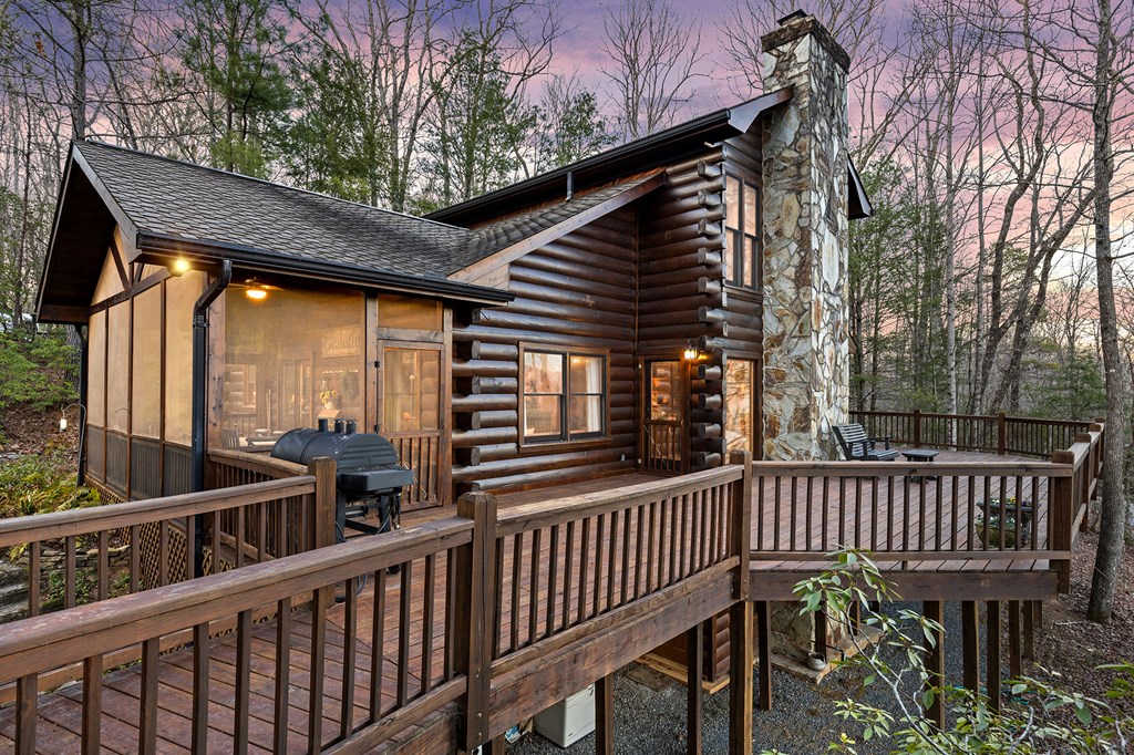 20 Broken Arrow Path Blue Ridge, GA 30513 - Photo 55 of 58 a view of a roof deck with wooden fence and floor