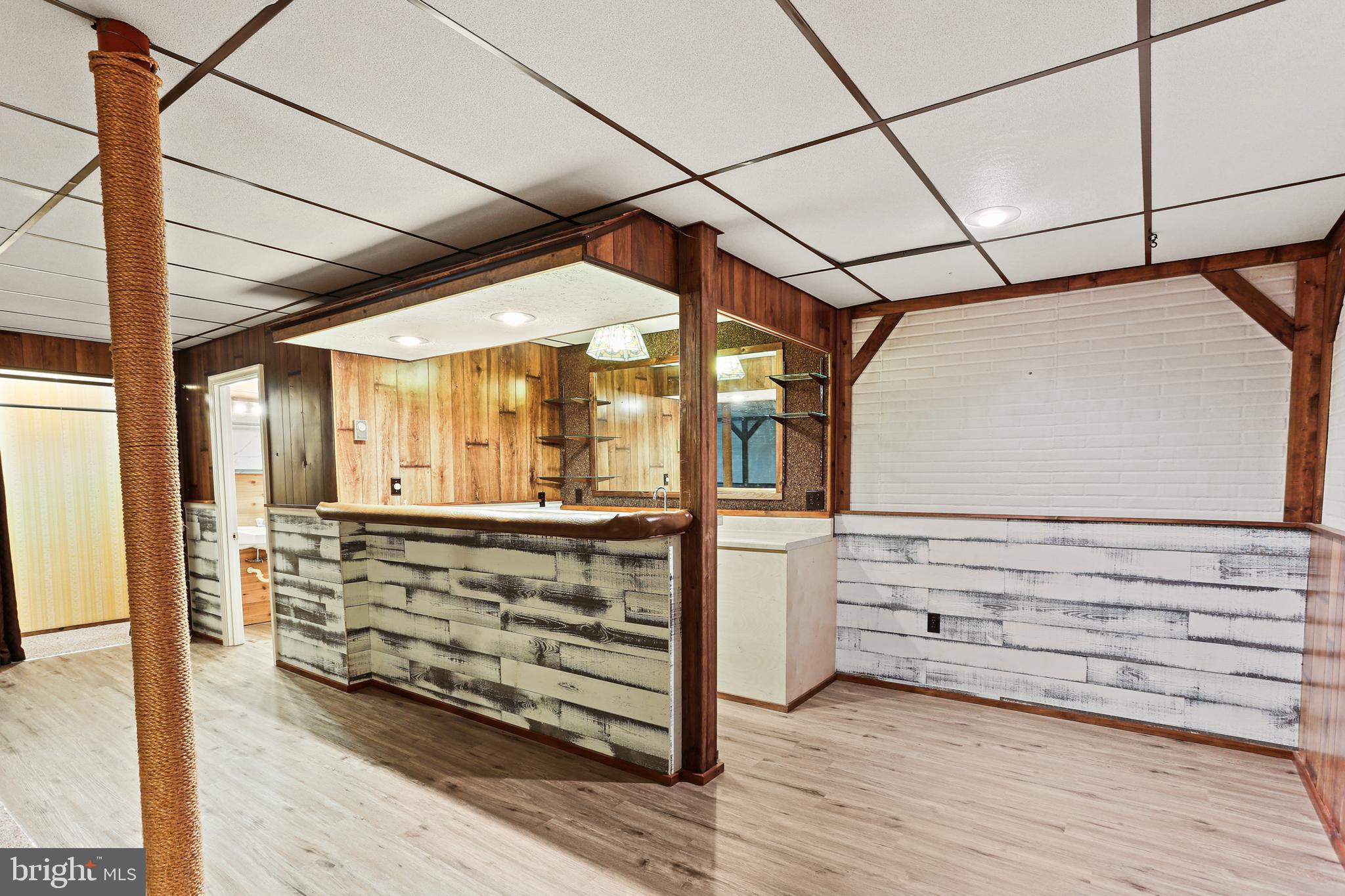 2509 Mt Ventus Road, Unit 1 Manchester, MD 21102 - Photo 23 of 46 Basement w/ Bar w/ LVP Floor