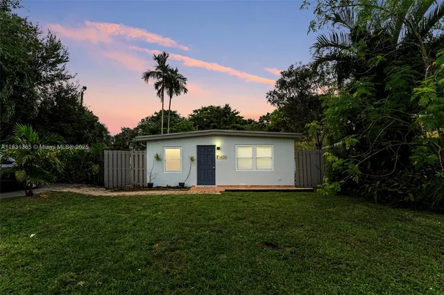 a house view with a garden space