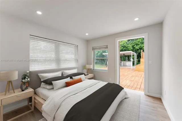 a kitchen with a sink a stove a refrigerator and a oven