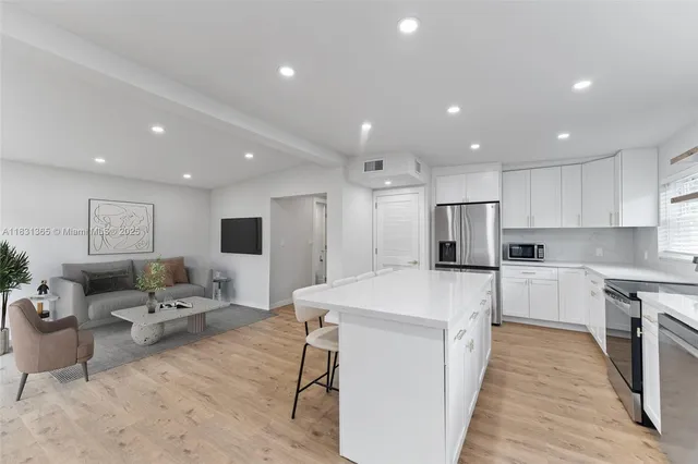 a view of swimming pool with a patio