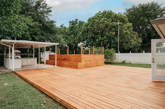 a view of pool with yard