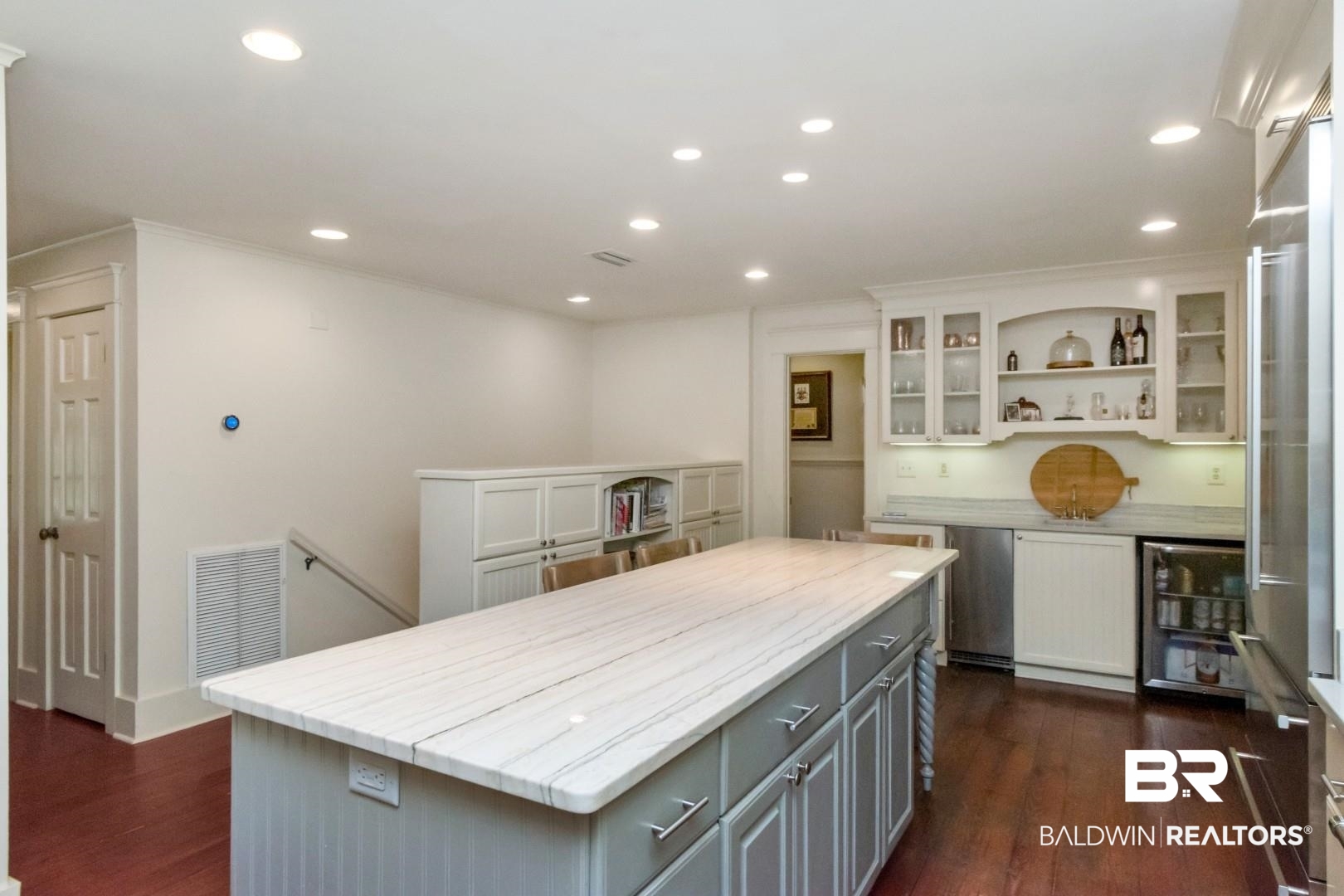 4810 Mums Court Mobile, AL 36608 - Photo 7 of 50 Kitchen with open shelves, gray cabinets, recessed lighting, a kitchen island, and glass insert cabinets