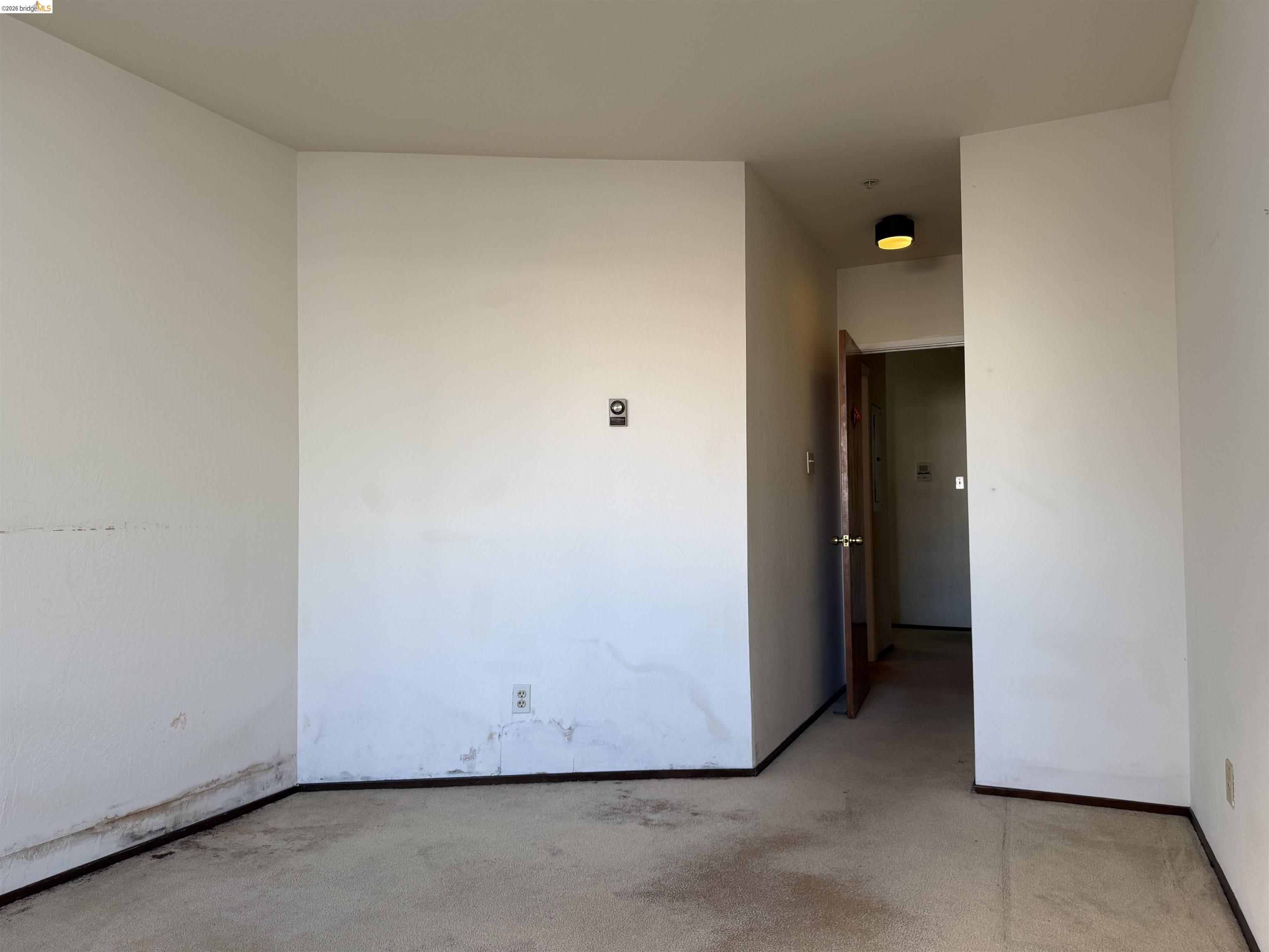 330 8th Street, Unit 3D Oakland, CA 94607 - Photo 12 of 13 Spare room with light carpet