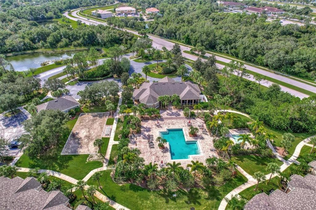 7417 Vista Way, Unit 202 Lakewood Ranch, FL 34202 - Photo 28 of 56 an aerial view of house with yard swimming pool and outdoor seating