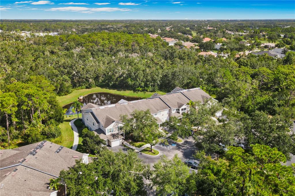 7417 Vista Way, Unit 202 Lakewood Ranch, FL 34202 - Photo 3 of 56 an aerial view of a house with a yard