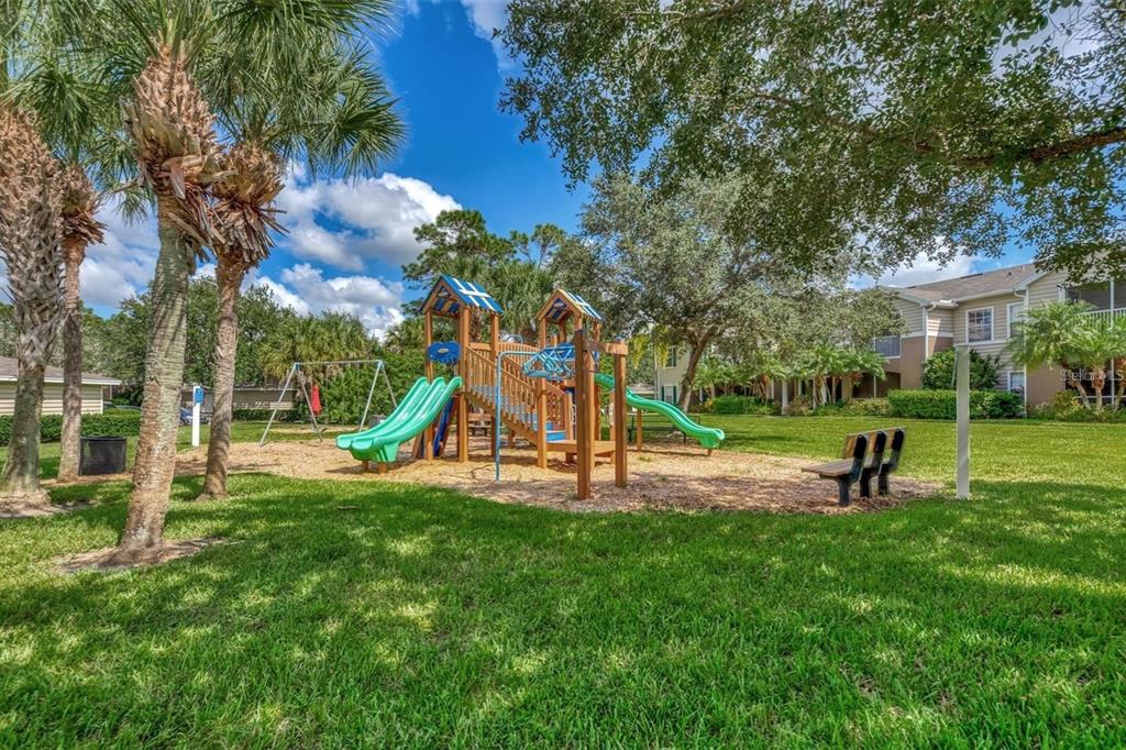7417 Vista Way, Unit 202 Lakewood Ranch, FL 34202 - Photo 40 of 56 a park with lots of green space and trees
