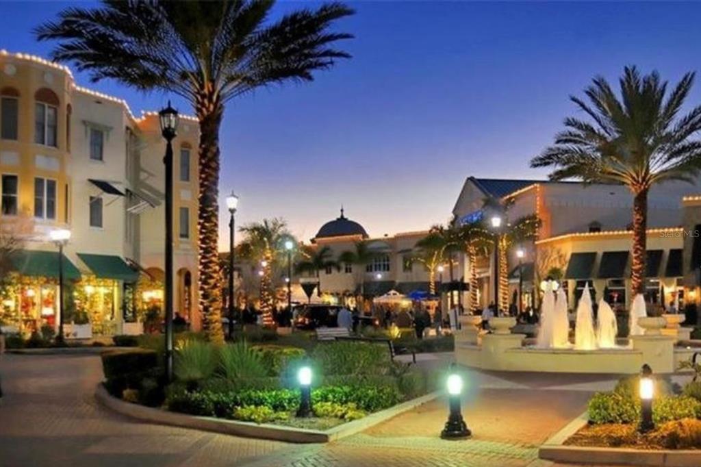 7417 Vista Way, Unit 202 Lakewood Ranch, FL 34202 - Photo 49 of 56 a view of a street with cars