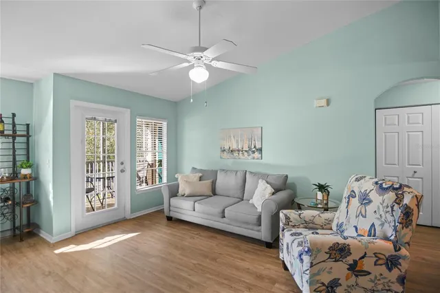 a living room with furniture and a window