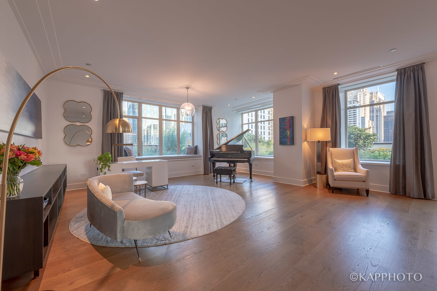 118 East Erie Street, Unit 15A Chicago, IL 60611 - Photo 14 of 28 a living room with furniture and a large window
