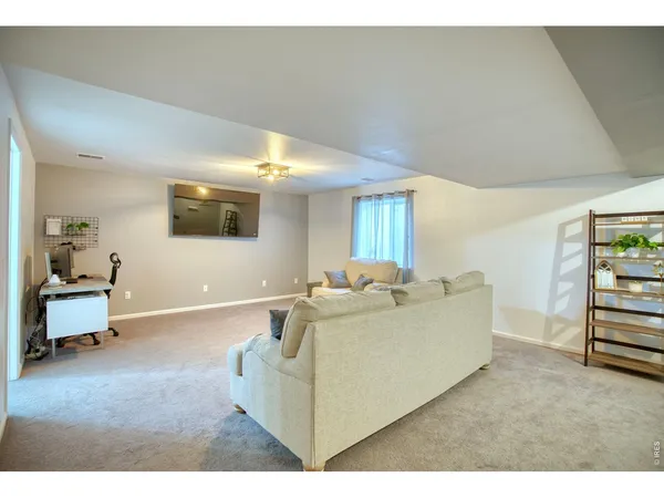 a kitchen that has a sink and a stove