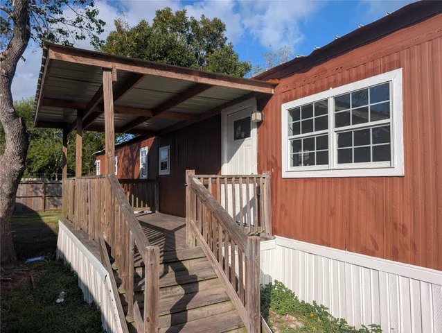 a kitchen with a stove and a refrigerator