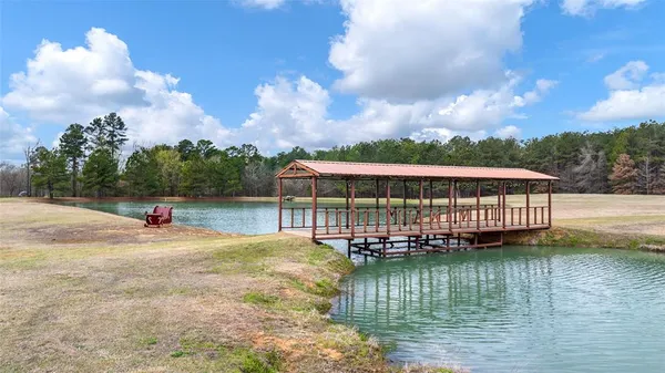 a view of a lake with a house