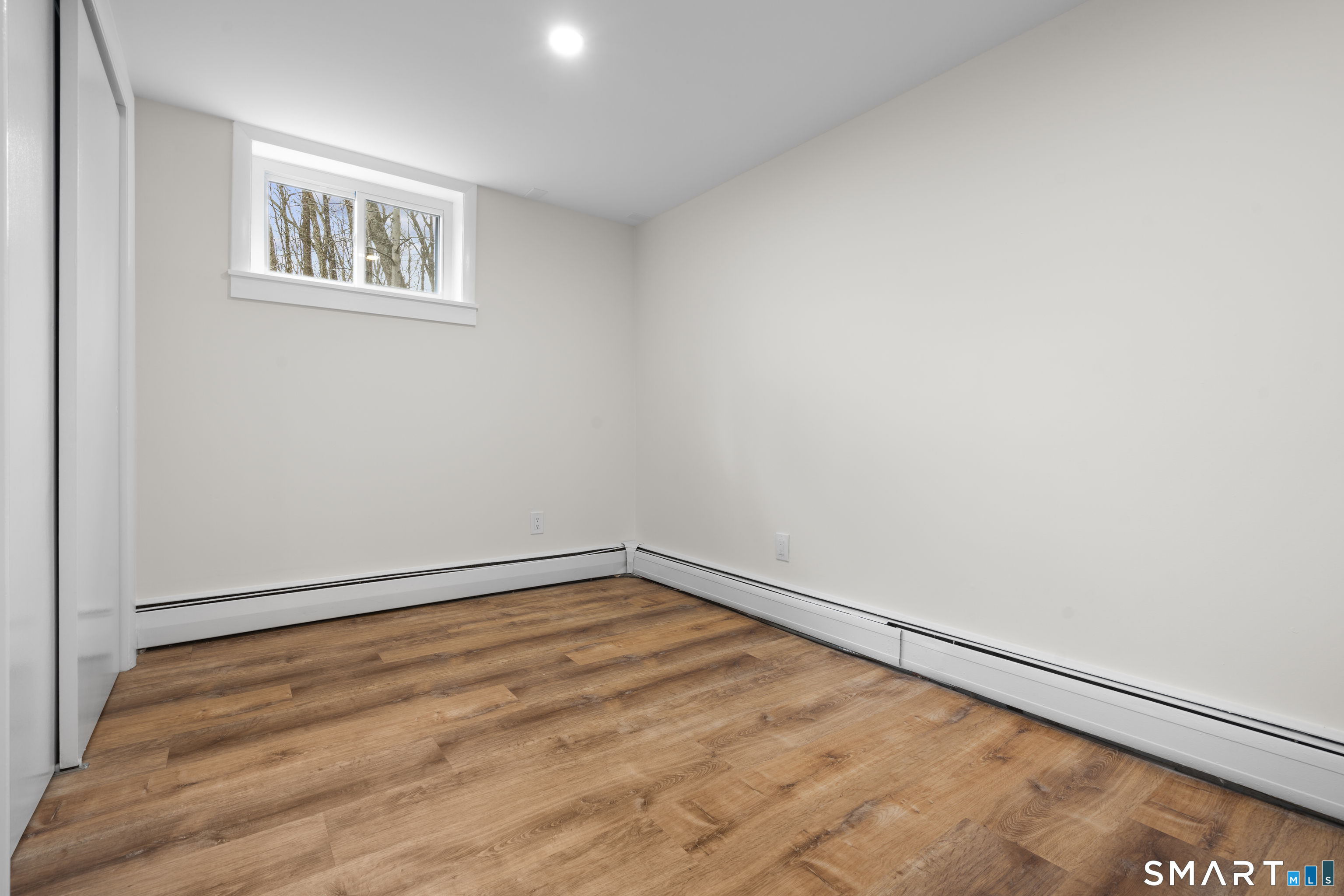 70 Dayton Road Redding, CT 06896 - Photo 24 of 38 a view of empty room with wooden floor